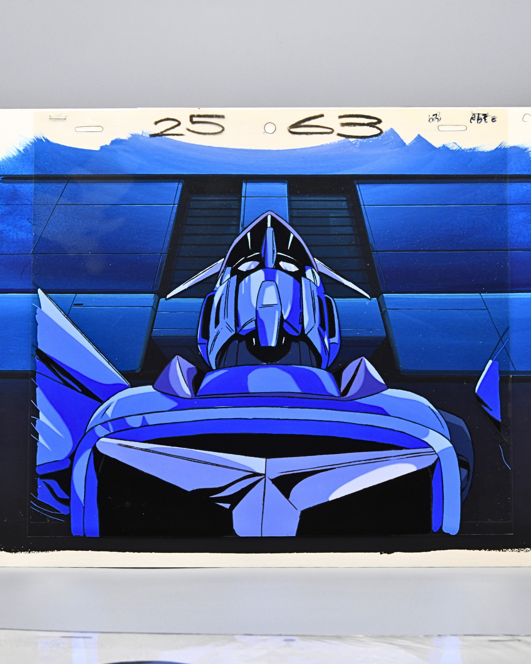 Blue mecha animation cel from the Mauer collection